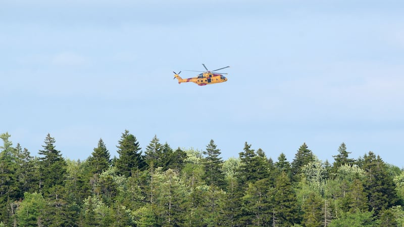 A Joint Rescue Coordination Centre helicopter searches the Aylesford Lake area following a boating accident on July 1, 2026. (Submitted: Bill Roberts)