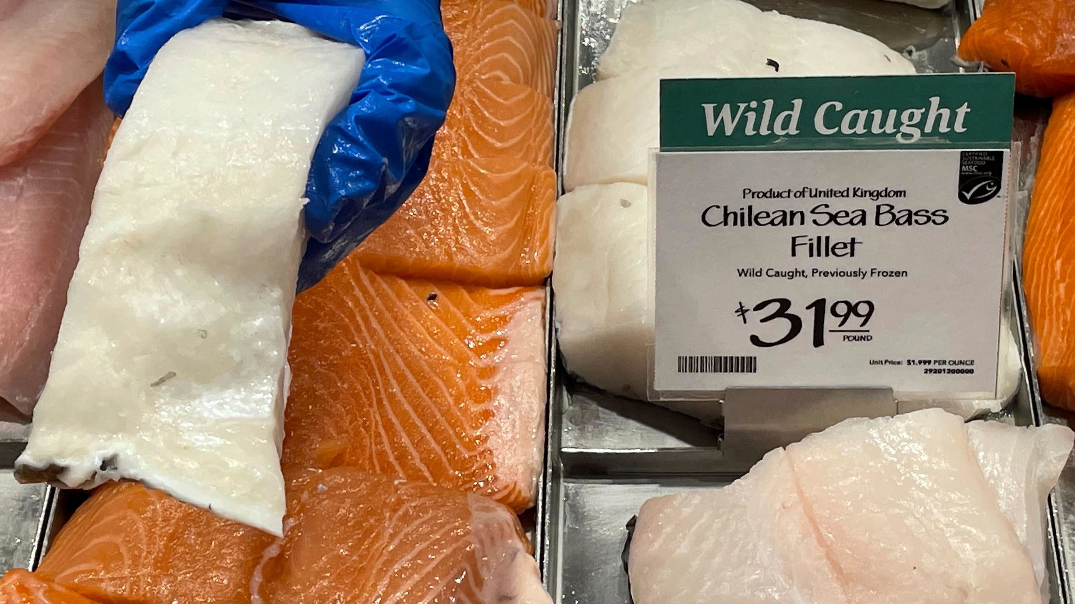 Filets of Chilean sea bass caught near the U.K.-controlled South Georgia island are displayed for sale at a Whole Foods Market in Cleveland, Ohio on June 17, 2022. (Joshua Goodman / AP Photo)