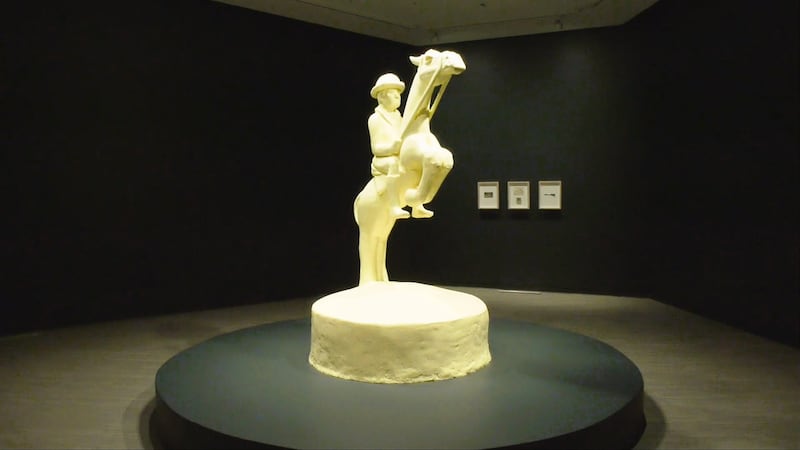 A giant cowboy sculpture made of butter. Ghazaleh Avarzamani's exhibit is called 'Churn, Earn, Burn and then Return.'