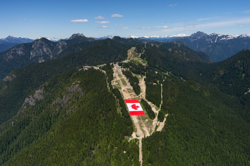 The flag measures 160 metres by 80 metres—roughly the size of two football fields—and weighs approximately 3,000 pounds. (Handout)