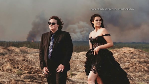‘Hope and the beauty’: Wildfire serves as ominous backdrop to grad photos