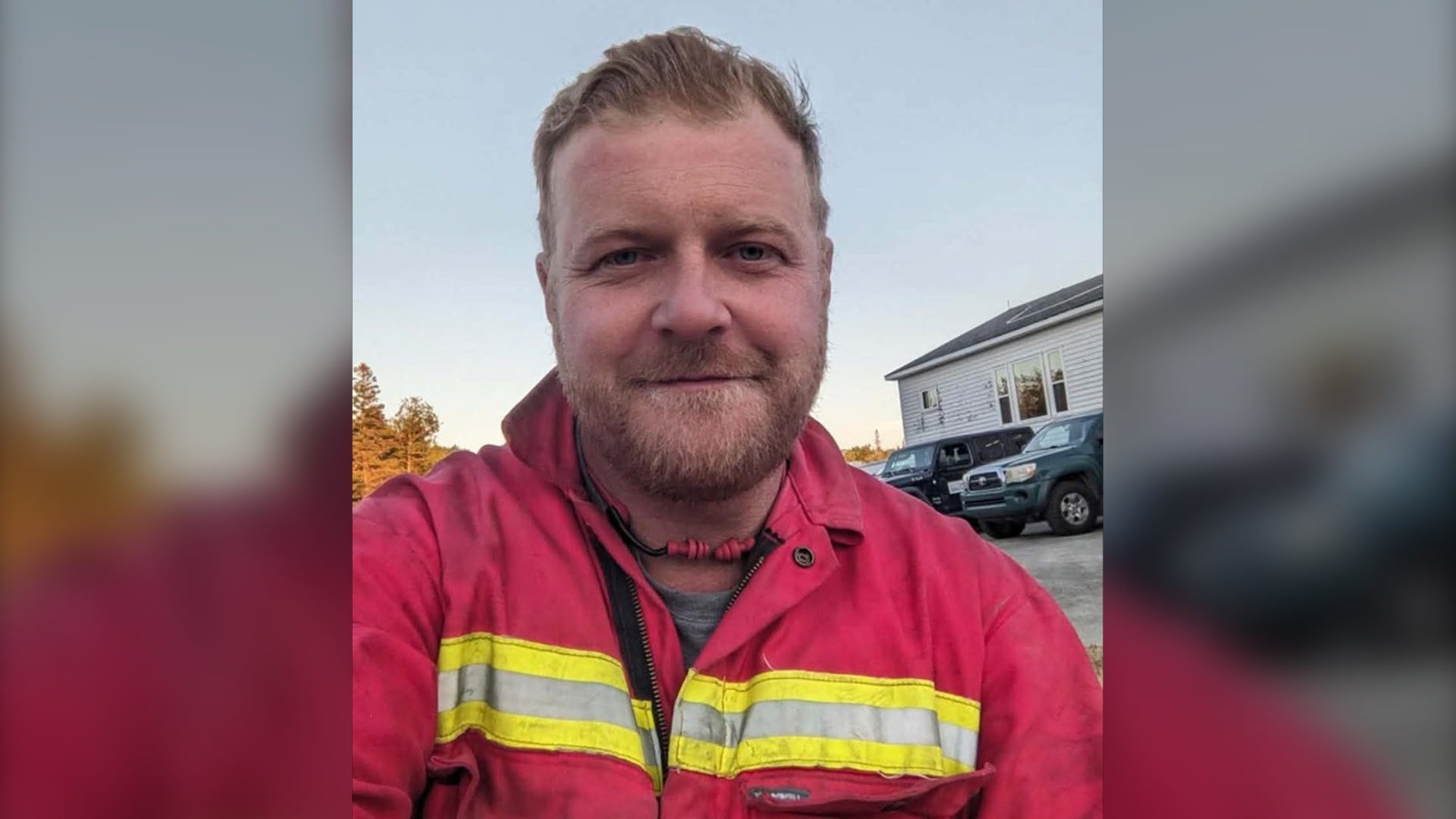 A firefighter is pictured posing for a selfie.