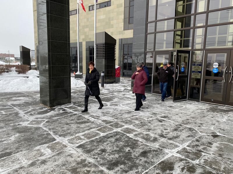 Friends and family or supporters of Bernard and Rose Marie Saulnier are seen outside of Moncton Law Courts. (CTV/Derek Haggett)