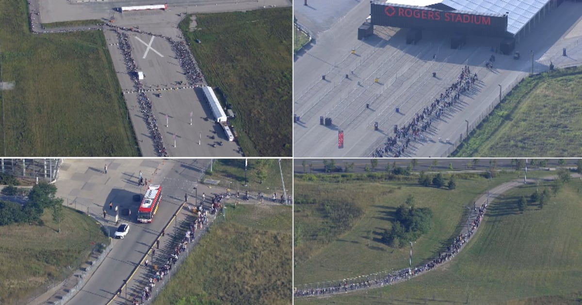 Thousand of fans wait outside of Rogers Stadium for BTS merch ahead of ...