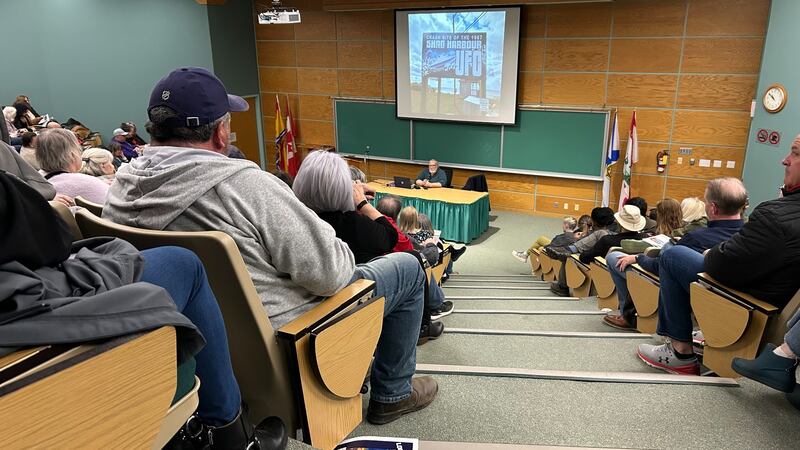 UFO expert Chris Styles is pictured speaking in a lecture hall to over 200 people at the Fredericton UFO Conference. (Avery MacRae, CTV Atlantic)