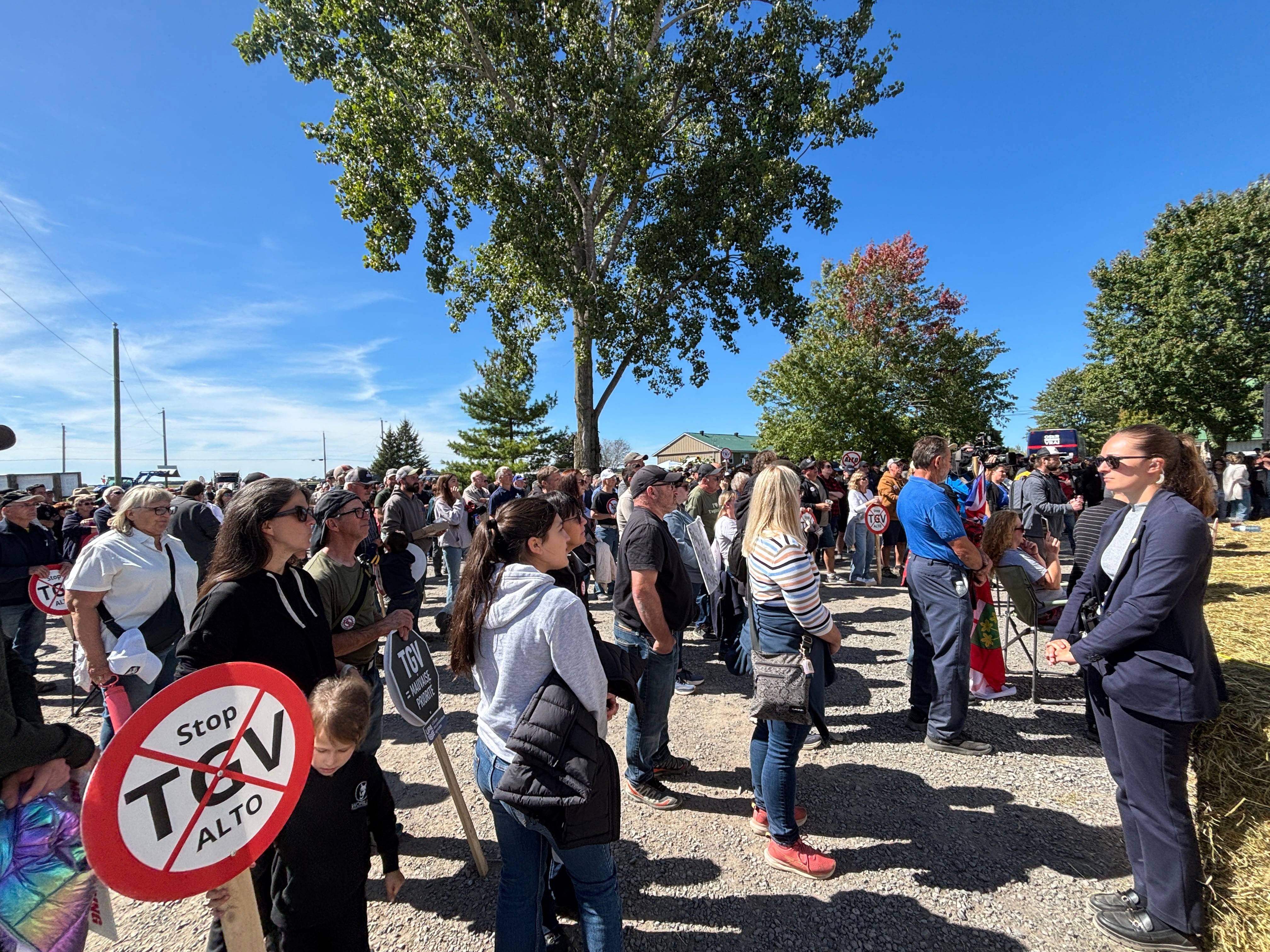 Farmers gather in Rigaud , Que . to protest Alto high - speed rail project