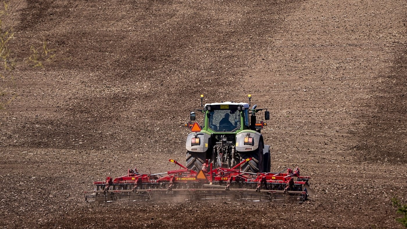 A farmer works a field in Churchville, N.S. on Monday, May 9, 2022. THE CANADIAN PRESS/Andrew Vaughan