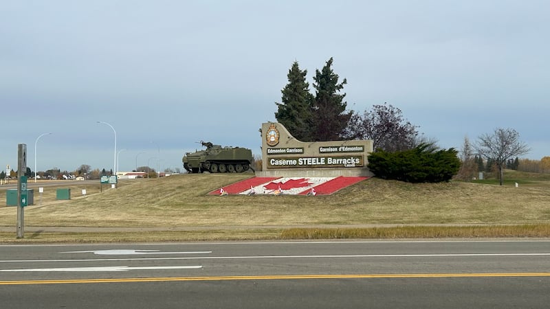 Canadian flags were seen at the entrance of CFB Edmonton on Oct. 19, 2026, two days after a deadly incident at CFB Wainwright in eastern Alberta. (Noah Rishaug / CTV News Edmonton)