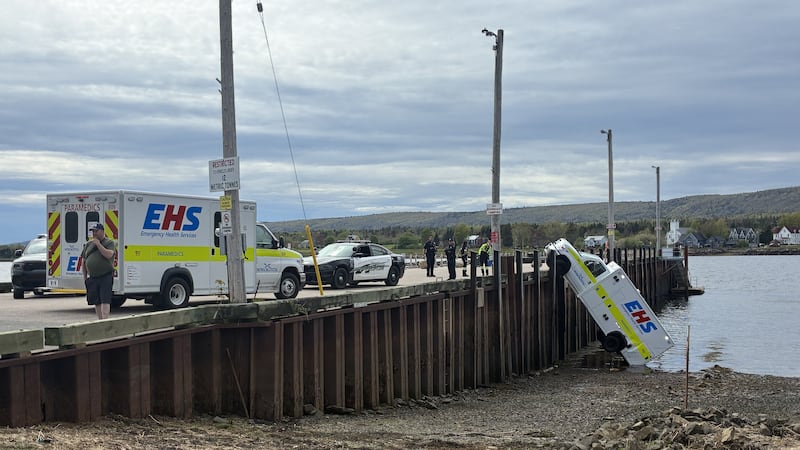 Ambulance falls off wharf